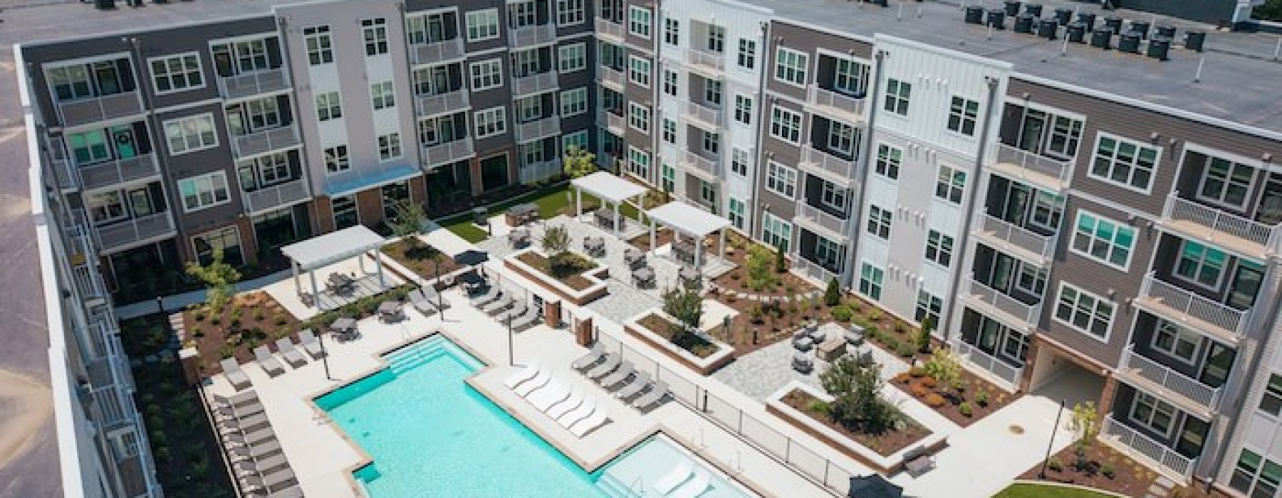 Resort-style swimming pool at Madison Ironbridge apartments in Chesterfield Virginia.