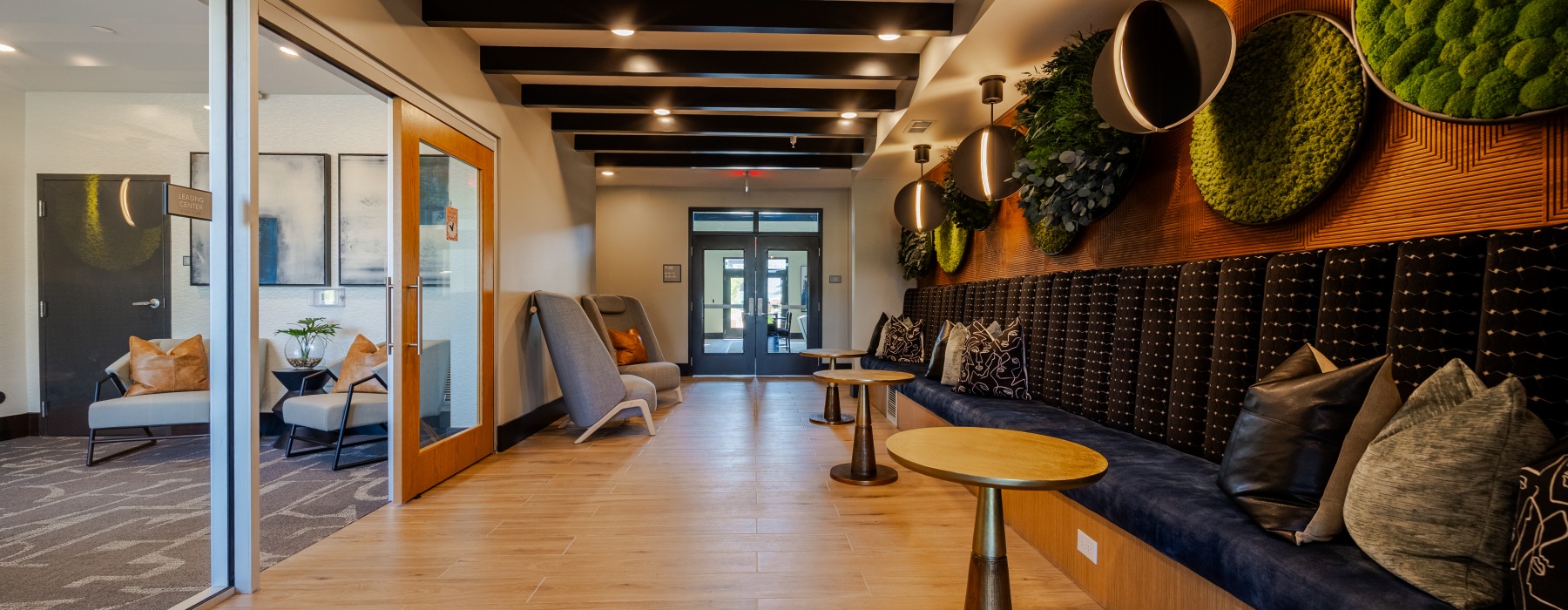 Modern clubhouse and resident lounge at Madison Ironbridge apartments in Chester Virginia.