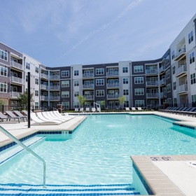The essence of exceptional living Resort-Style Pool with In-Water Lounge Chairs