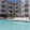 a building with a pool in front
