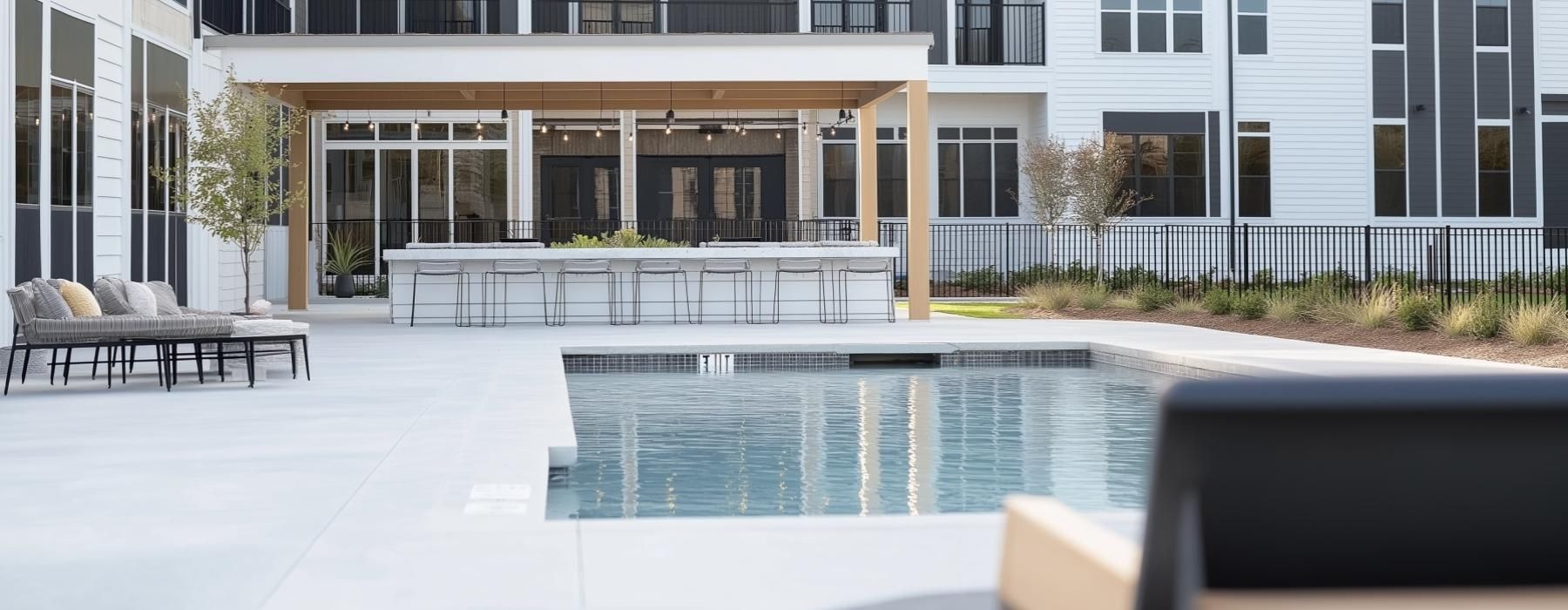 a swimming pool in front of a building